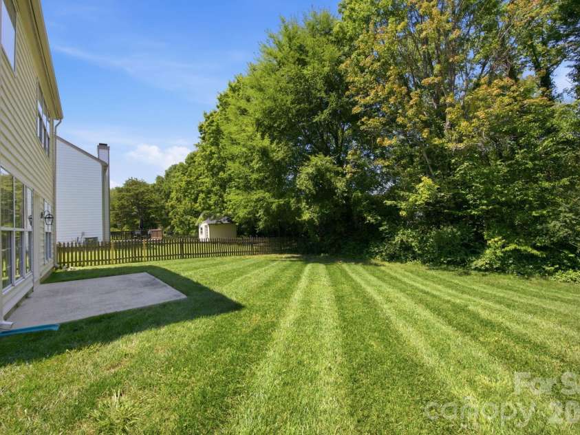 124 Aylesbury Lane, Indian Trail, NC 28079.  MLS# CAR4416136, YatesRealty ID 46745. Fenced backyard