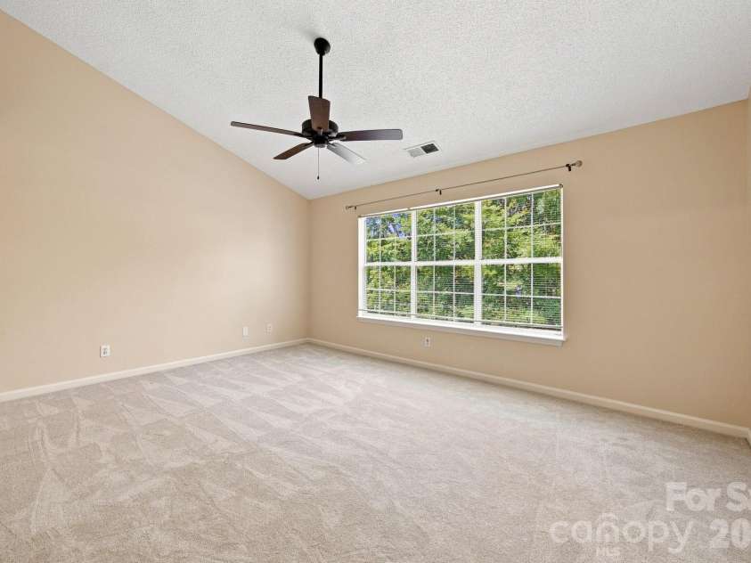 124 Aylesbury Lane, Indian Trail, NC 28079.  MLS# CAR4416136, YatesRealty ID 46745. Primary Bedroom has vaulted ceiling