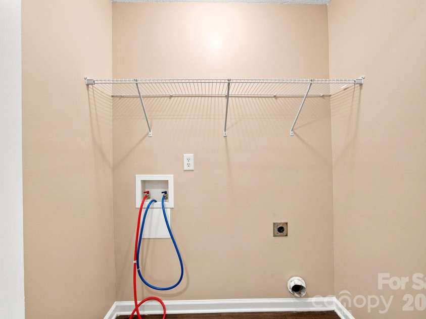 124 Aylesbury Lane, Indian Trail, NC 28079.  MLS# CAR4416136, YatesRealty ID 46745. Second Floor Laundry Closet