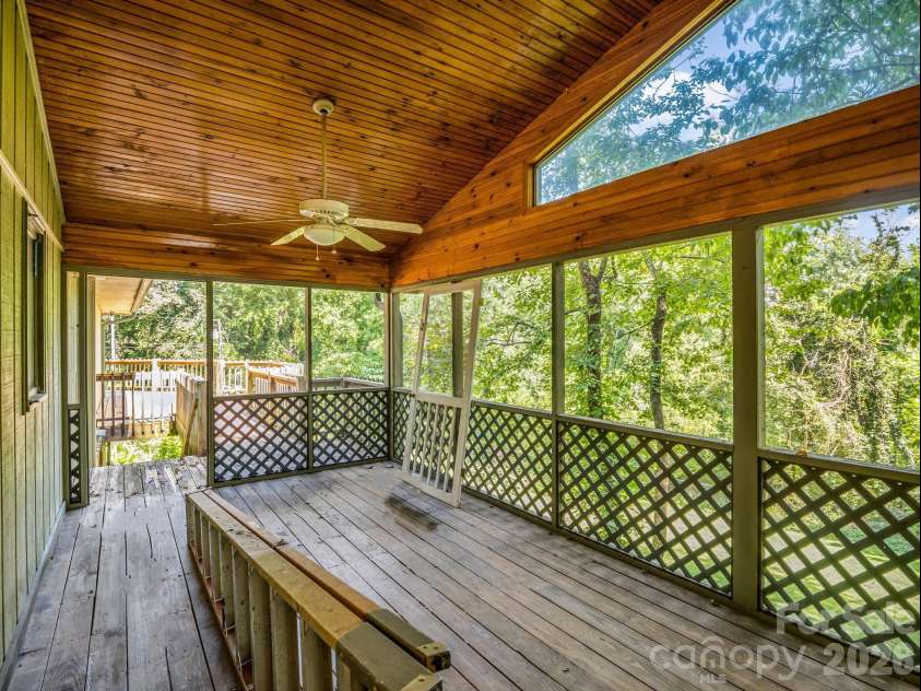 200 Woodland Circle, Rutherfordton, NC 28139.  MLS# CAR4418275, YatesRealty ID 46769. Screened Porch