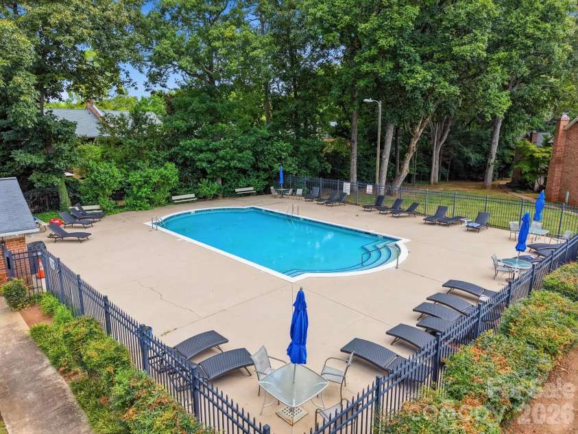 5901 Quail Hollow Road, Charlotte, NC 28210.  MLS# CAR4411743, YatesRealty ID 46771. The community pool