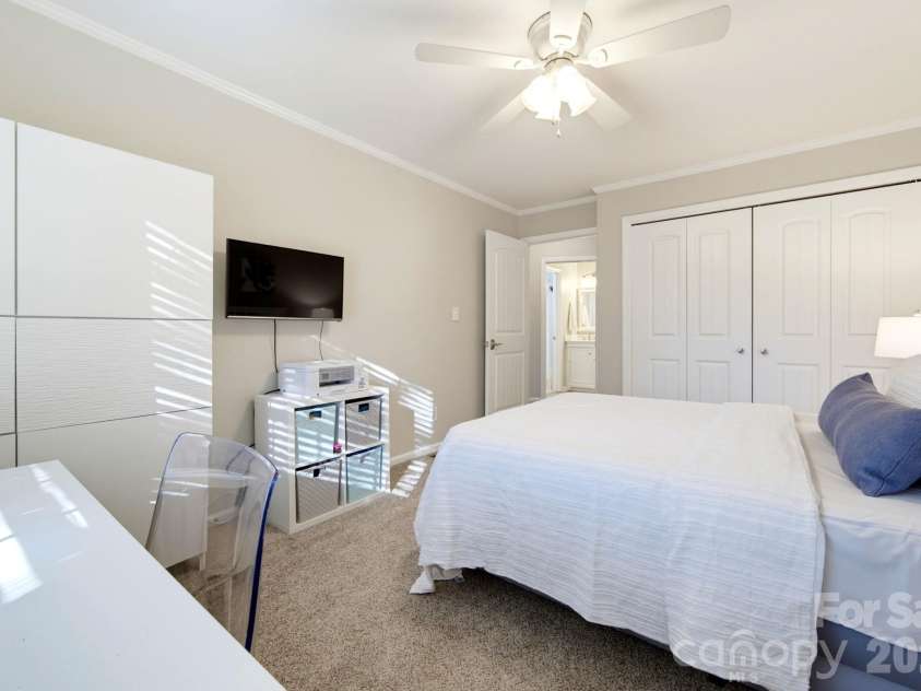 5901 Quail Hollow Road, Charlotte, NC 28210.  MLS# CAR4430297, YatesRealty ID 46771. Versatile secondary bedroom easily accommodates overnight guests, additional storage and a home office setup