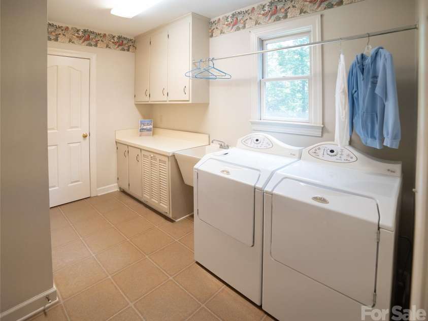 417 Stonecroft Drive, Lenoir, NC 28645.  MLS# CAR4409106, YatesRealty ID 46772. Laundry Room With Utility Sink