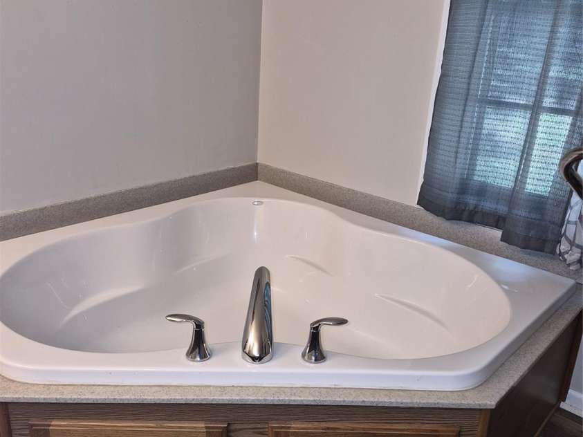 24161 Cedar Ridge Lane, Albemarle, NC 28001.  MLS# CAR4413458, YatesRealty ID 46775. BATHROOM IN MASTER BEDROOM