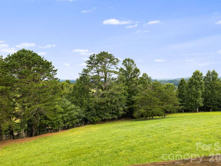 194 Cabin Hollow Drive, Marshall, NC 28753.  MLS# CAR4414308, YatesRealty ID 46778. Backyard