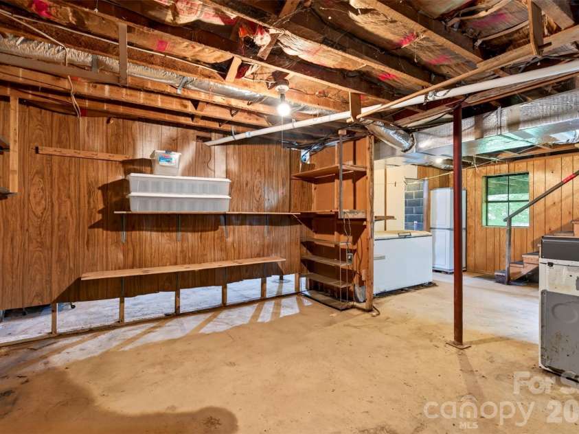 2 White Oak Road, Arden, NC 28704.  MLS# CAR4418090, YatesRealty ID 46781. Basement shop