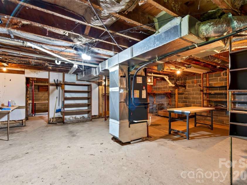 2 White Oak Road, Arden, NC 28704.  MLS# CAR4418090, YatesRealty ID 46781. Basement shop
