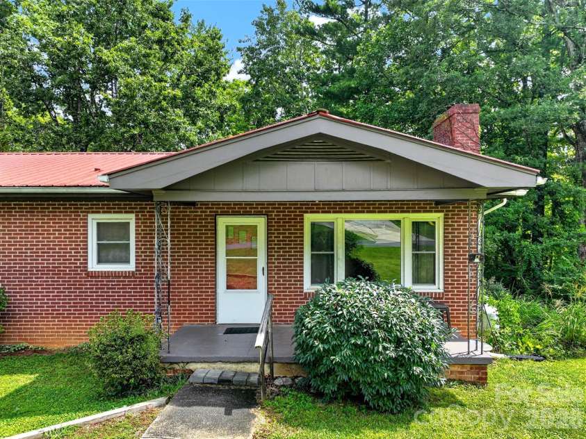 2 White Oak Road, Arden, NC 28704.  MLS# CAR4418090, YatesRealty ID 46781. Covered front porch