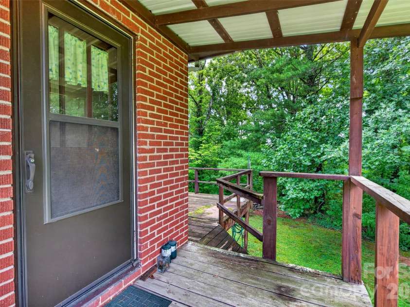 2 White Oak Road, Arden, NC 28704.  MLS# CAR4418090, YatesRealty ID 46781. Side porch