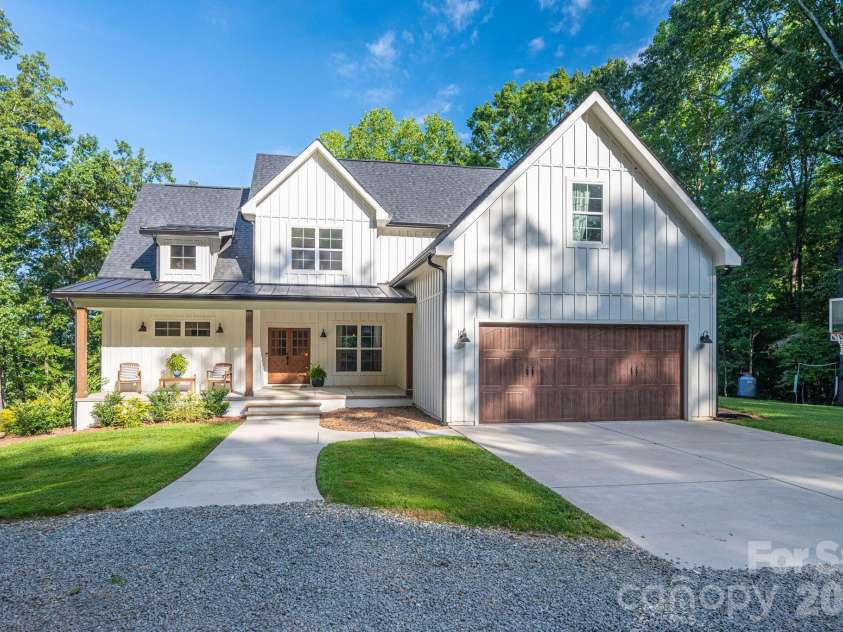 340 Whippoorwill Lane, Mount Holly, NC 28120.  MLS# CAR4417978, YatesRealty ID 46788. Frontal view of home