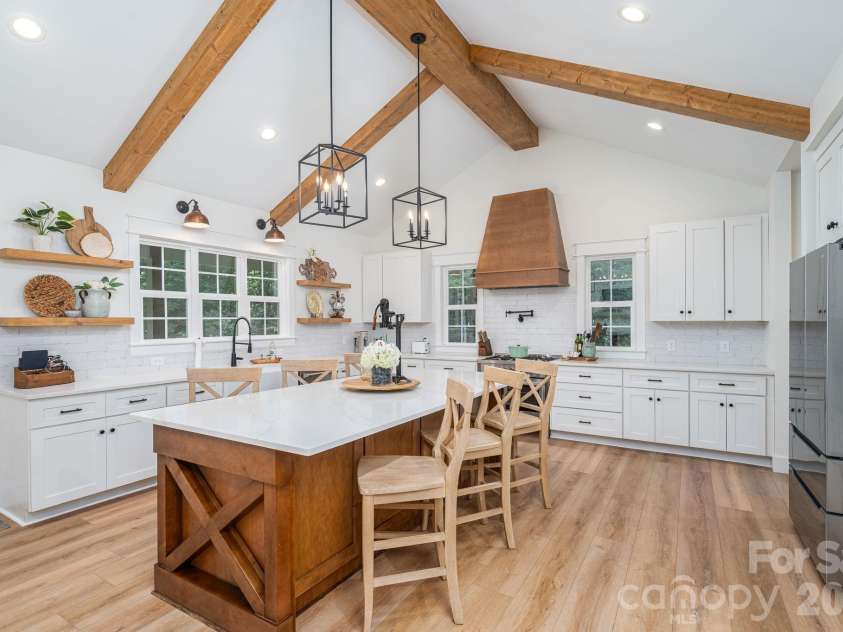 340 Whippoorwill Lane, Mount Holly, NC 28120.  MLS# CAR4417978, YatesRealty ID 46788. Kitchen with oversized eat-in island
