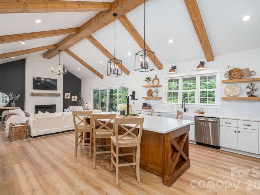340 Whippoorwill Lane, Mount Holly, NC 28120.  MLS# CAR4417978, YatesRealty ID 46788. Looking from kitchen into living area