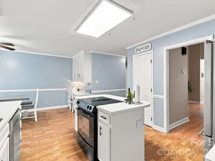 106 Webbed Foot Road, Mooresville, NC 28117.  MLS# CAR4416003, YatesRealty ID 46790. Easy Flow Between the Kitchen & Dining Area