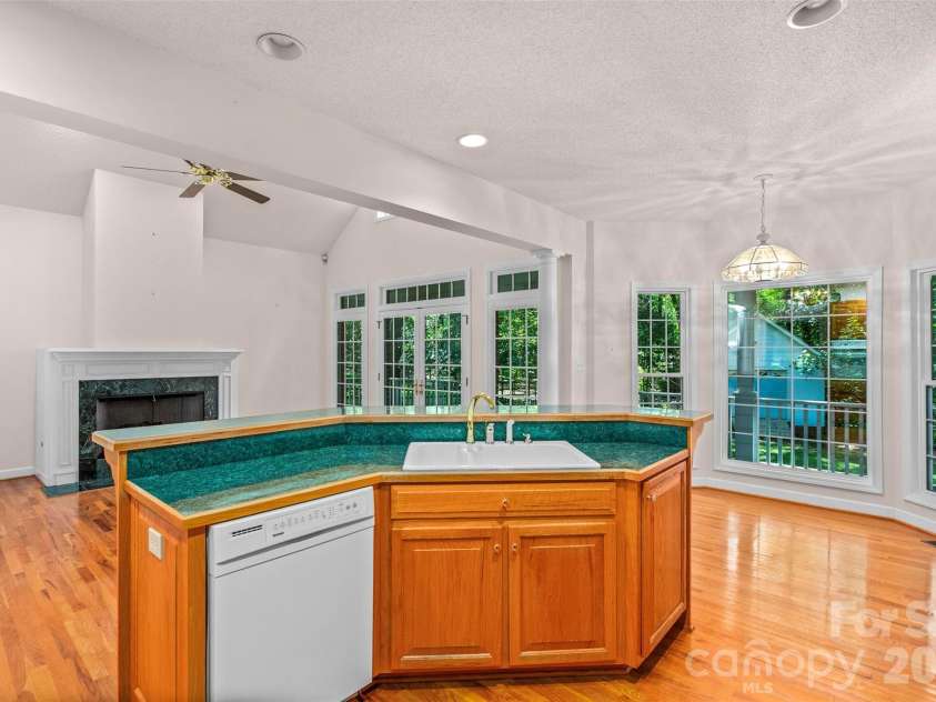 6756 Hawks Nest Lane, Stanley, NC 28164.  MLS# CAR4416084, YatesRealty ID 46791. Kitchen view to great room