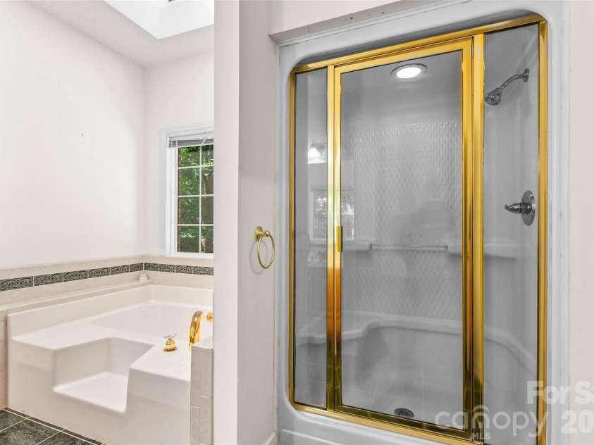 6756 Hawks Nest Lane, Stanley, NC 28164.  MLS# CAR4416084, YatesRealty ID 46791. Primary bathroom