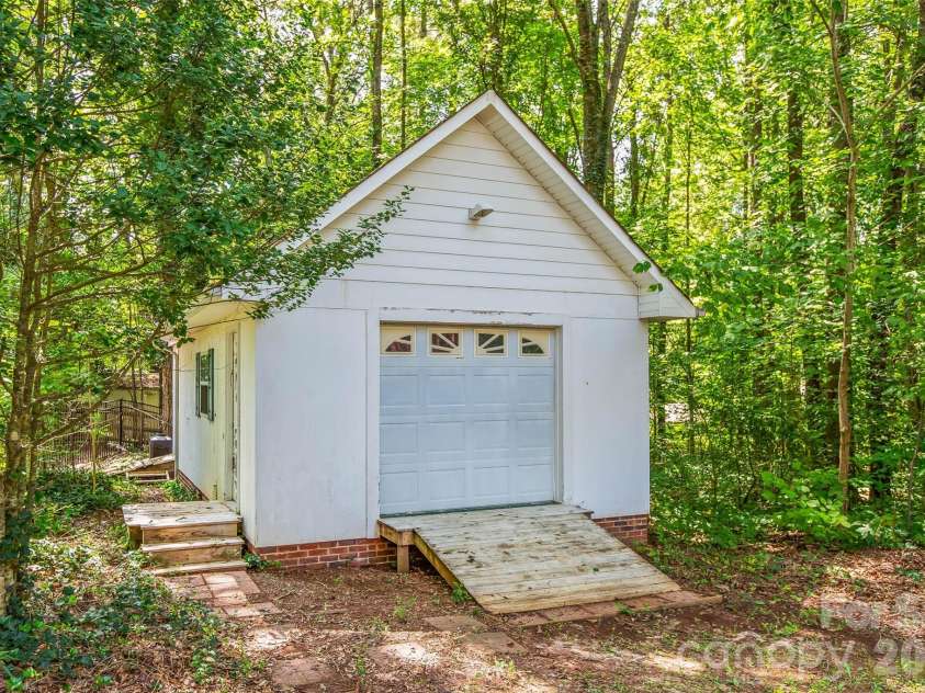 6756 Hawks Nest Lane, Stanley, NC 28164.  MLS# CAR4416084, YatesRealty ID 46791. Workshop room 1 exterior