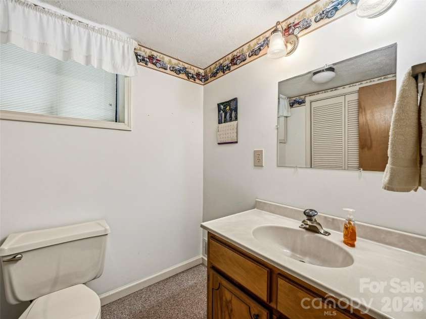 126 Surry Lane, Hendersonville, NC 28791.  MLS# CAR4388301, YatesRealty ID 46792. 