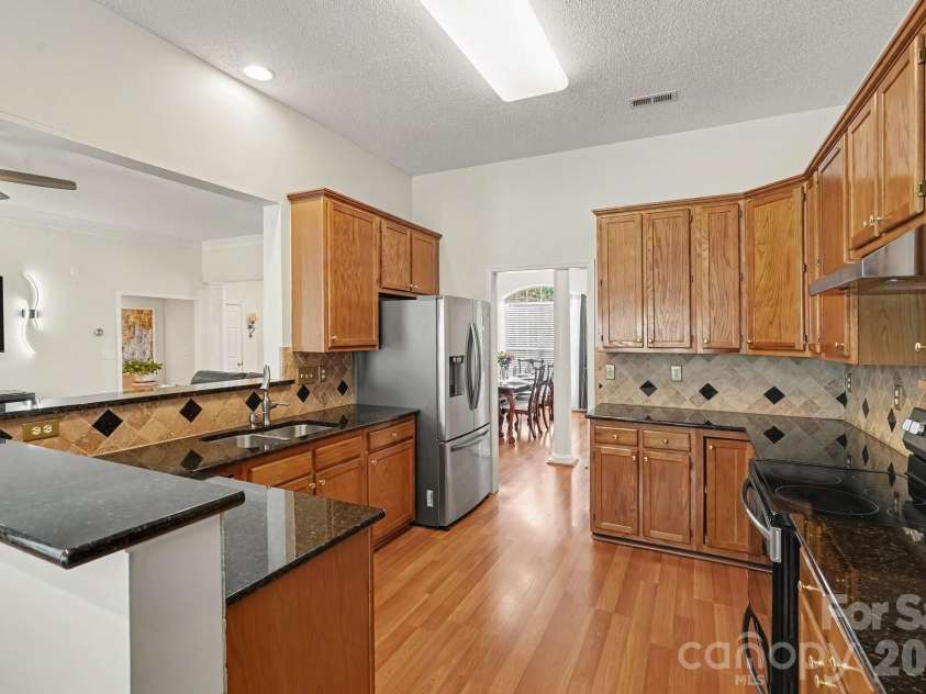 1523 Sweetgum Lane, Matthews, NC 28105.  MLS# CAR4416587, YatesRealty ID 46798. 