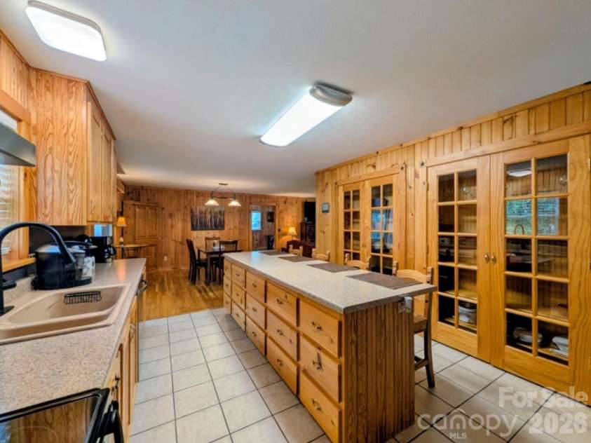 213 Rustling Pines Drive, Hendersonville, NC 28792.  MLS# CAR4418354, YatesRealty ID 46806. Kitchen