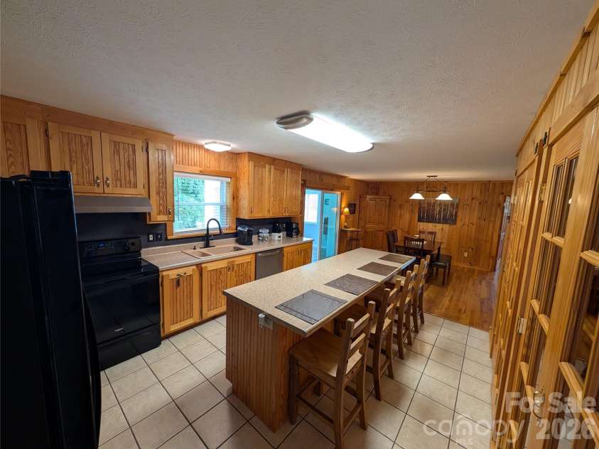 213 Rustling Pines Drive, Hendersonville, NC 28792.  MLS# CAR4418354, YatesRealty ID 46806. Kitchen