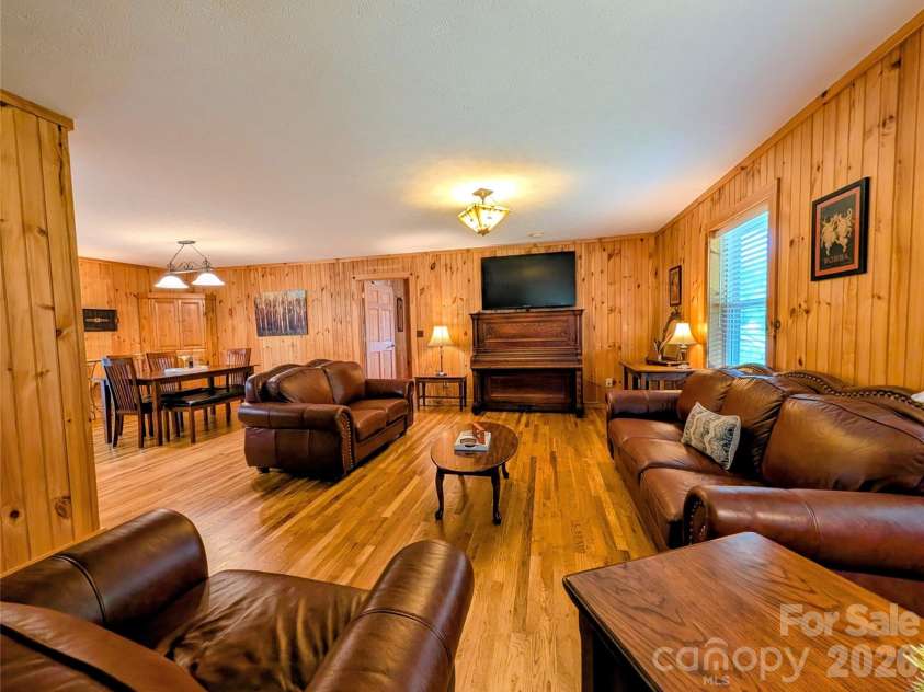 213 Rustling Pines Drive, Hendersonville, NC 28792.  MLS# CAR4418354, YatesRealty ID 46806. Livingroom