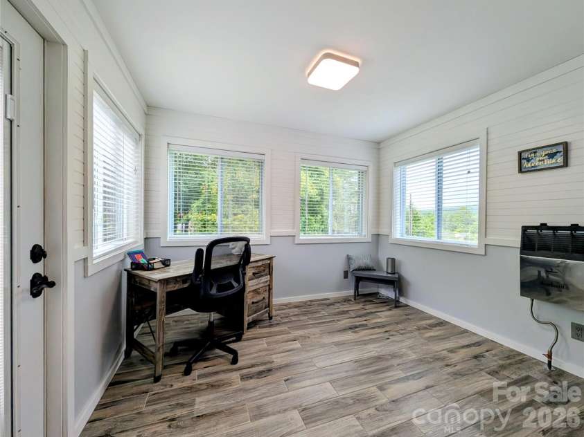 213 Rustling Pines Drive, Hendersonville, NC 28792.  MLS# CAR4418354, YatesRealty ID 46806. Sunroom w/ Heater