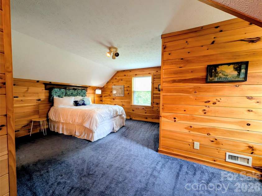 213 Rustling Pines Drive, Hendersonville, NC 28792.  MLS# CAR4418354, YatesRealty ID 46806. Upstairs Bedroom