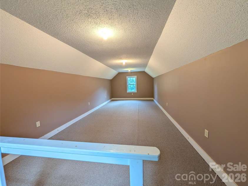 213 Rustling Pines Drive, Hendersonville, NC 28792.  MLS# CAR4418354, YatesRealty ID 46806. Upstairs Detached Garage