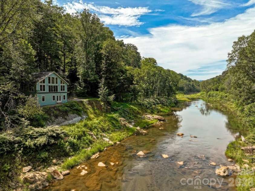 359 Shull Farm Road, Burnsville, NC 28714.  MLS# CAR4418216, YatesRealty ID 46807. Cane River Frontage