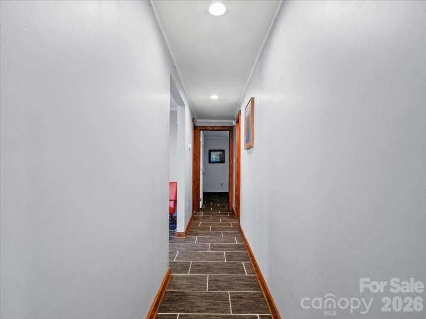 359 Shull Farm Road, Burnsville, NC 28714.  MLS# CAR4418216, YatesRealty ID 46807. Main level Hallway.