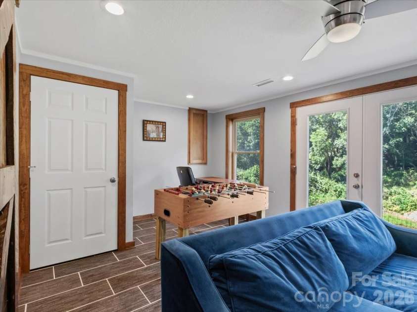 359 Shull Farm Road, Burnsville, NC 28714.  MLS# CAR4418216, YatesRealty ID 46807. Main level river views!