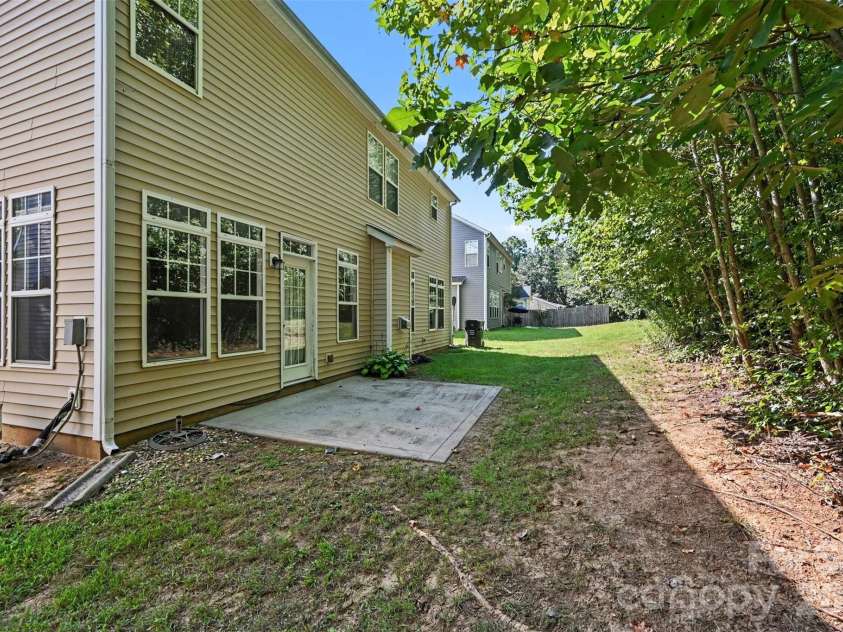 1745 Wilburn Park Lane, Charlotte, NC 28269.  MLS# CAR4418353, YatesRealty ID 46810. Back Exterior