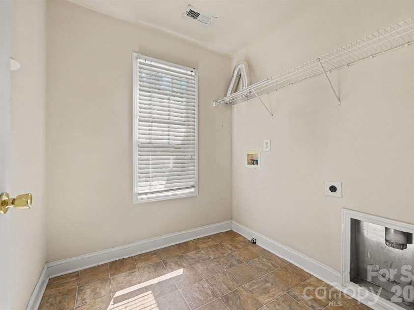 1745 Wilburn Park Lane, Charlotte, NC 28269.  MLS# CAR4418353, YatesRealty ID 46810. Second Floor Laundry Room