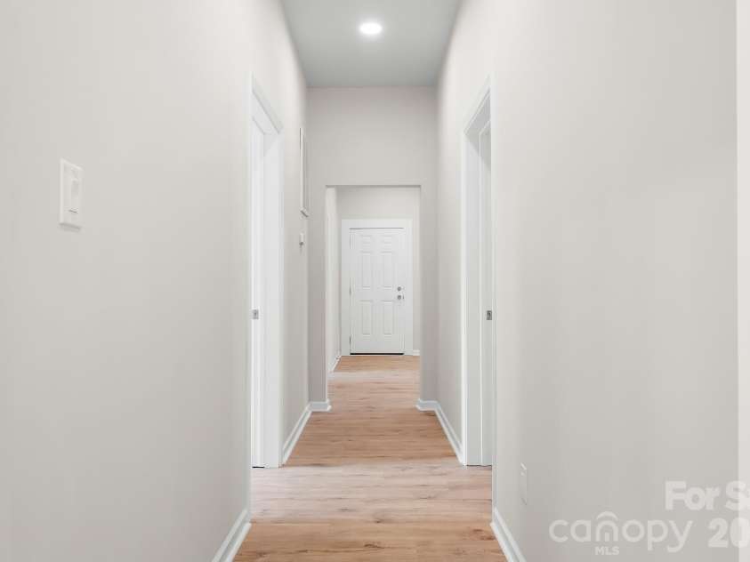 104 1st Avenue, China Grove, NC 28023.  MLS# CAR4418382, YatesRealty ID 46813. Inviting hallway with a bright, open feel