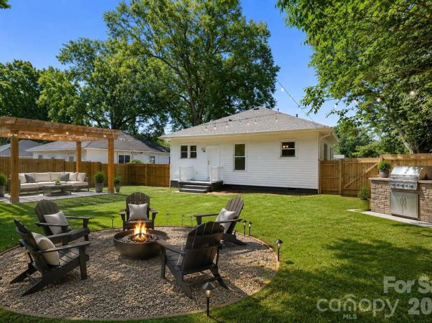 104 1st Avenue, China Grove, NC 28023.  MLS# CAR4418382, YatesRealty ID 46813. Spacious, fully fenced backyard offering privacy and plenty of possibilities. Virtually staged