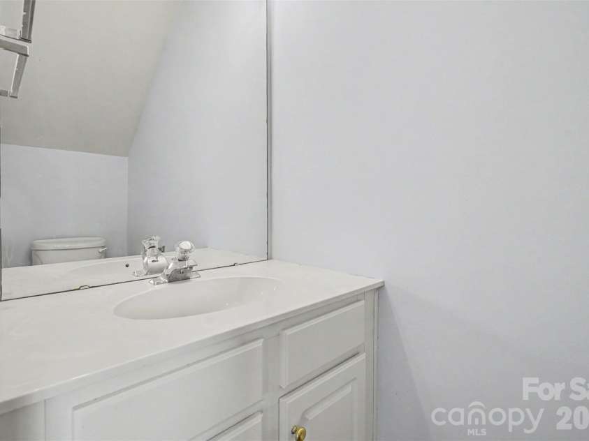 2410 Normancrest Court, Charlotte, NC 28270.  MLS# CAR4417418, YatesRealty ID 46819. Half bath downstairs