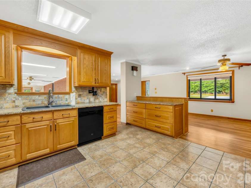 2570 Lentz Road, China Grove, NC 28023.  MLS# CAR4385487, YatesRealty ID 4682. Pass-through to sunroom