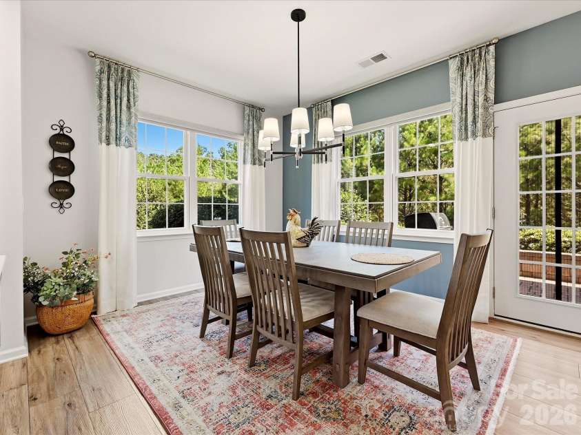 5060 Big Bend Drive, Lancaster, SC 29720.  MLS# CAR4414688, YatesRealty ID 46826. Large Breakfast Room with Wide Plank Flooring, Custom Remote Shades, Access to Patio