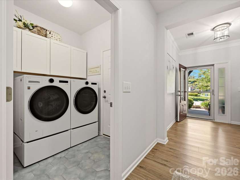 5060 Big Bend Drive, Lancaster, SC 29720.  MLS# CAR4414688, YatesRealty ID 46826. Laundry Room with New Flooring and Cabinets added over appliances
