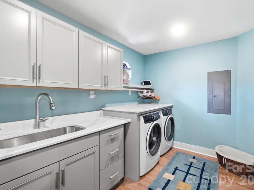 9265 Belle Pines Court, Sherrills Ford, NC 28673.  MLS# CAR4413675, YatesRealty ID 46829. Main floor laundry room