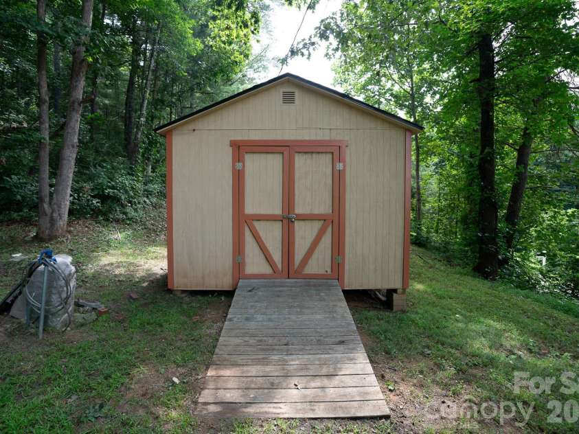 27 Lela Lane, Alexander, NC 28701.  MLS# CAR4411994, YatesRealty ID 46837. Shed