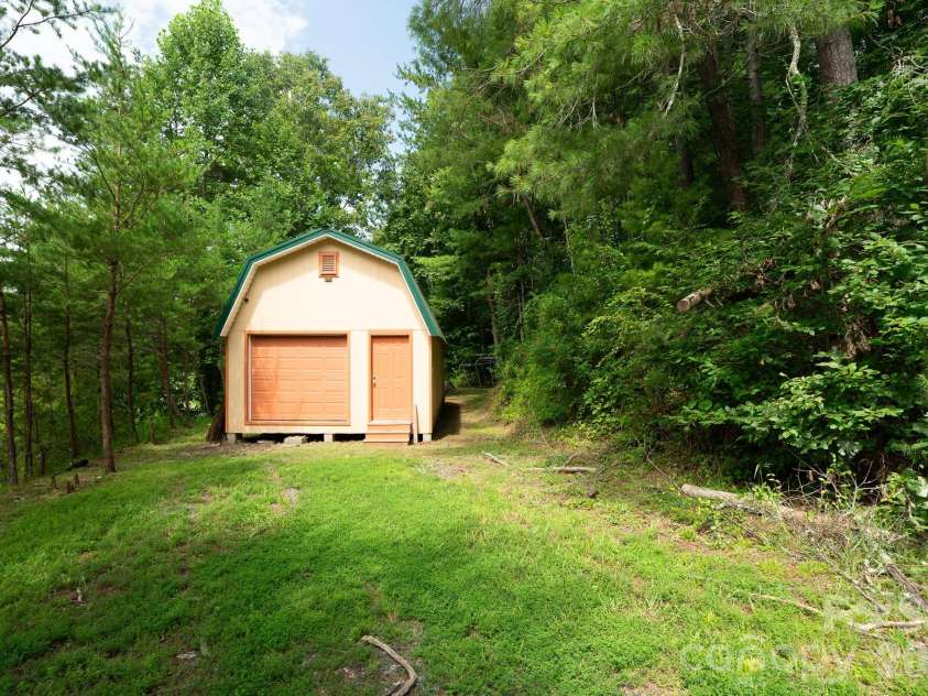 27 Lela Lane, Alexander, NC 28701.  MLS# CAR4411994, YatesRealty ID 46837. Workshop