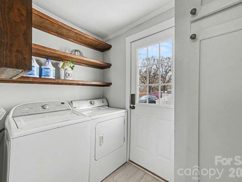 207 East Avenue, Kannapolis, NC 28083.  MLS# CAR4342348, YatesRealty ID 4685. Laundry at rear entry.