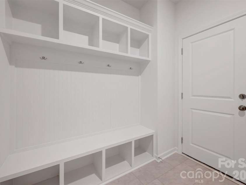 245 Amber Glen Drive, Locust, NC 28097.  MLS# CAR4416138, YatesRealty ID 46852. Garage entry