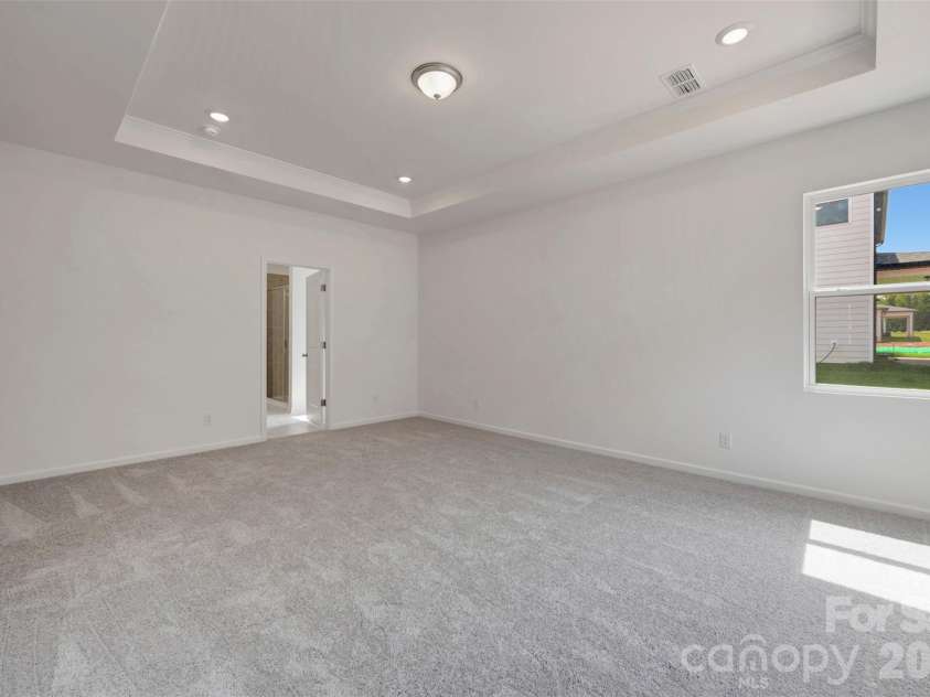 245 Amber Glen Drive, Locust, NC 28097.  MLS# CAR4416138, YatesRealty ID 46852. Owner's suite