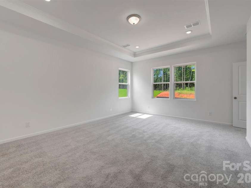 245 Amber Glen Drive, Locust, NC 28097.  MLS# CAR4416138, YatesRealty ID 46852. Owner's suite