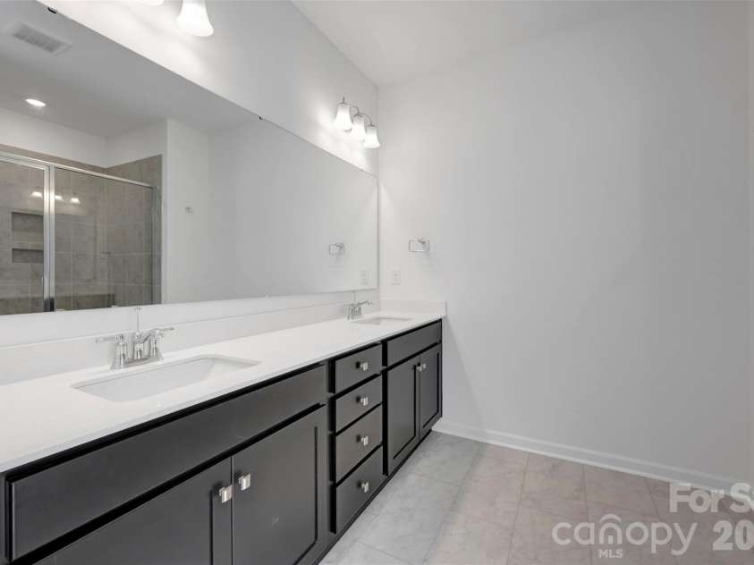 245 Amber Glen Drive, Locust, NC 28097.  MLS# CAR4416138, YatesRealty ID 46852. Owner's suite