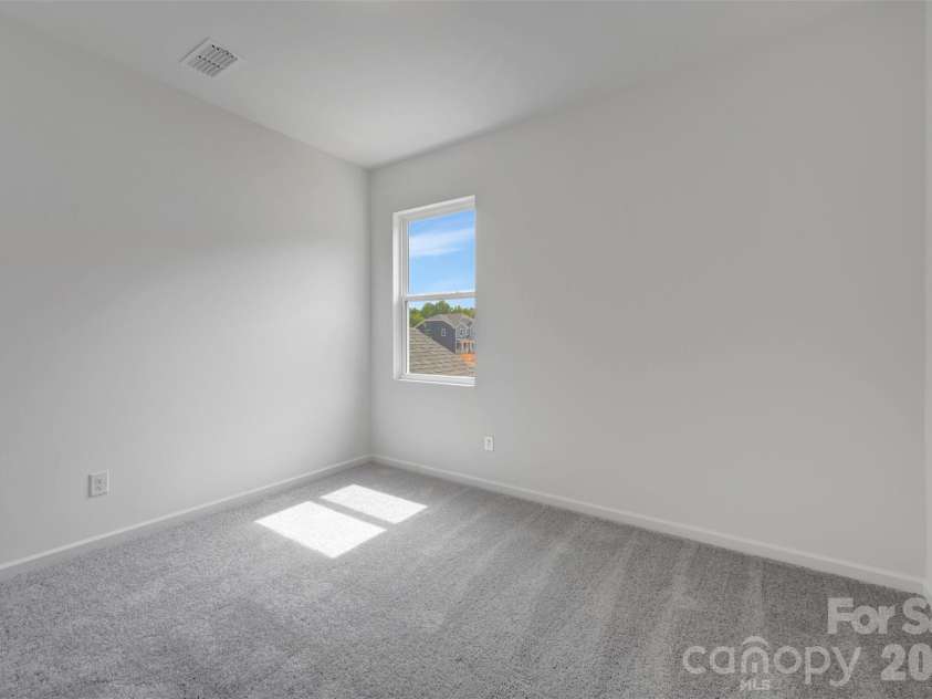 245 Amber Glen Drive, Locust, NC 28097.  MLS# CAR4416138, YatesRealty ID 46852. Secondary bedroom