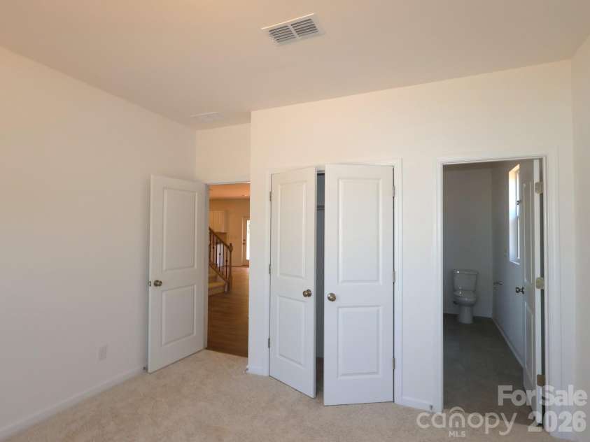 249 Amber Glen Drive, Locust, NC 28097.  MLS# CAR4416144, YatesRealty ID 46853. First floor guest suite