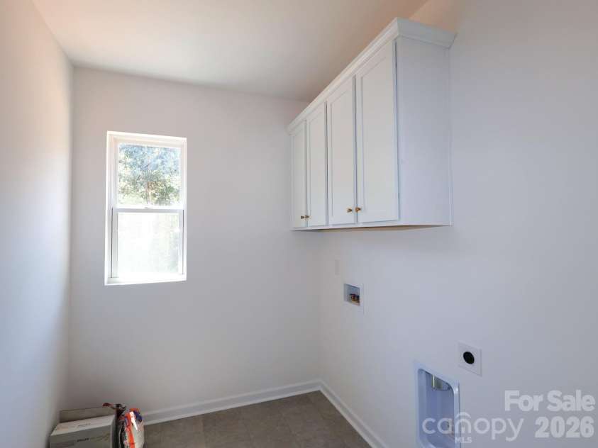 249 Amber Glen Drive, Locust, NC 28097.  MLS# CAR4416144, YatesRealty ID 46853. Laundry room